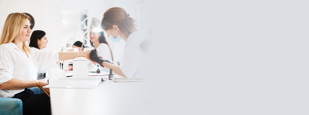 An image of nail clients in a nail salon