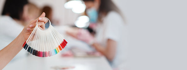 An image of a range of gel nail colors in a nail salon