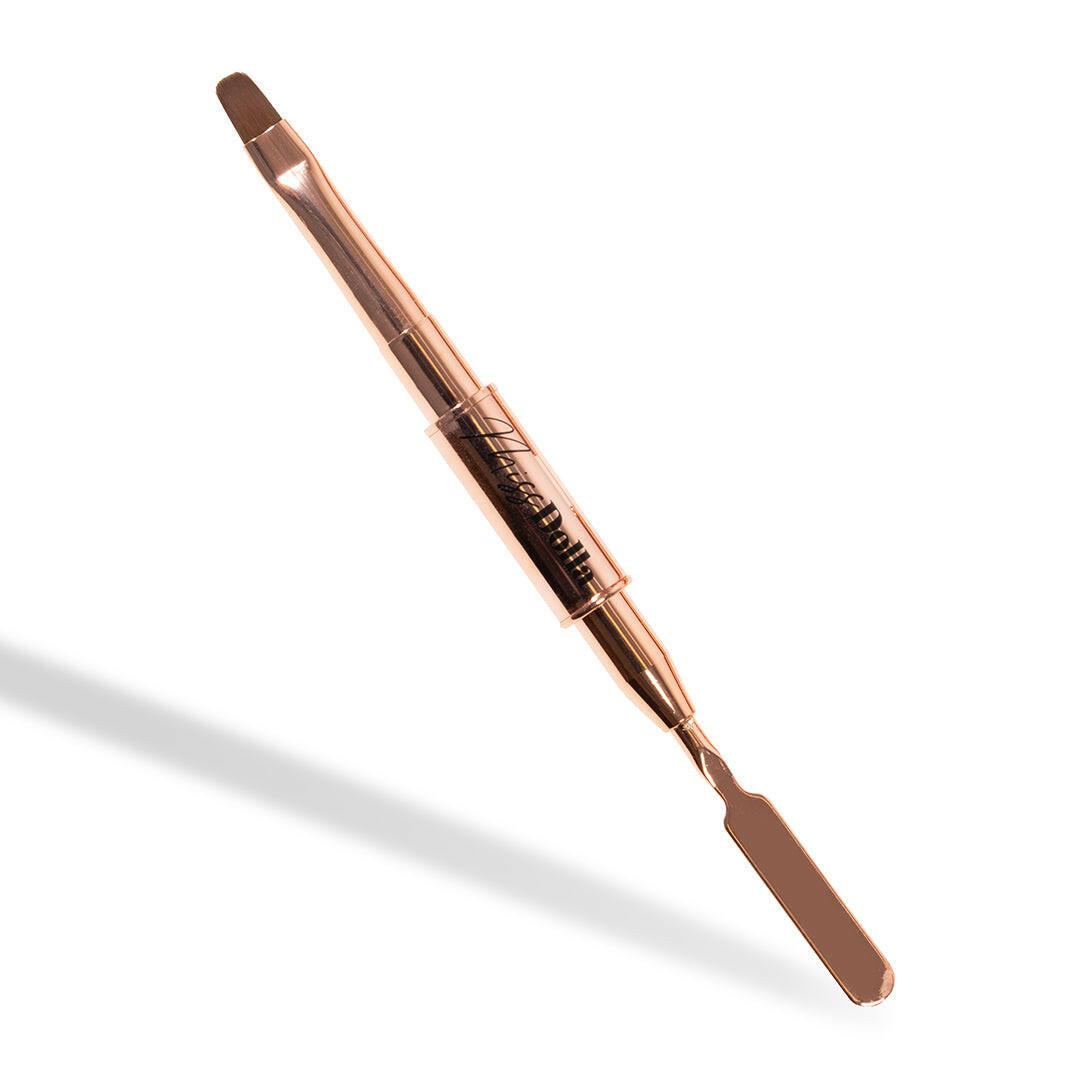 Miss Dolla brush for precise cuticle cleanup and color application.